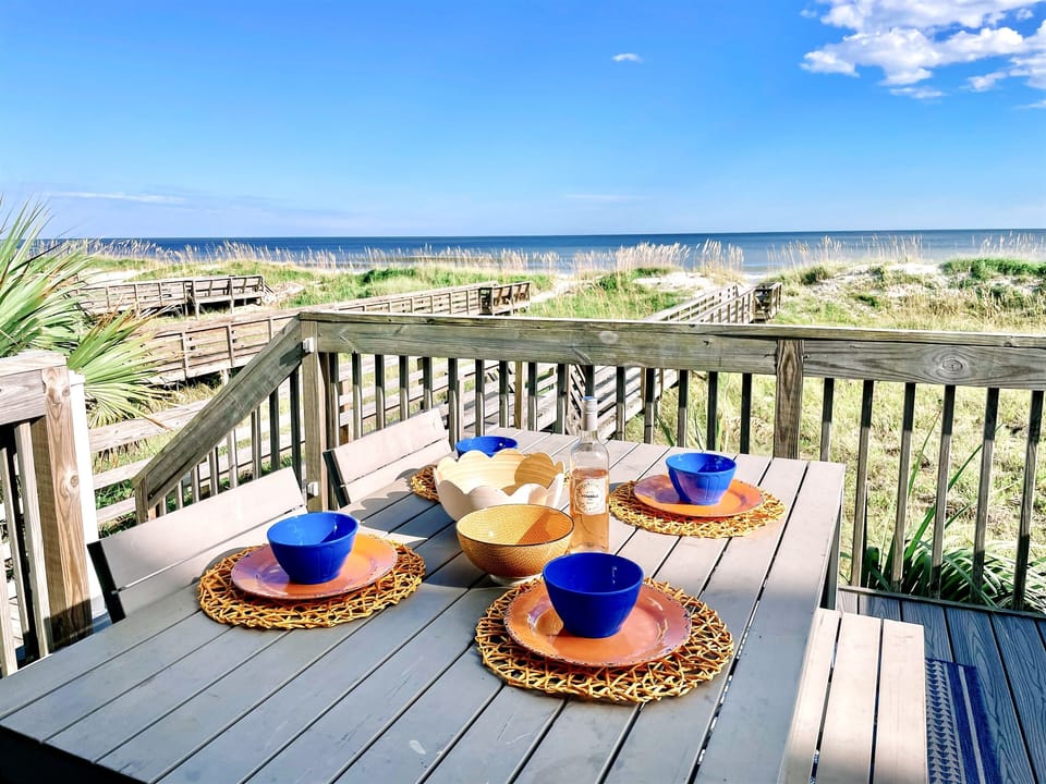 Dining al fresco with the sound of the crashing waves