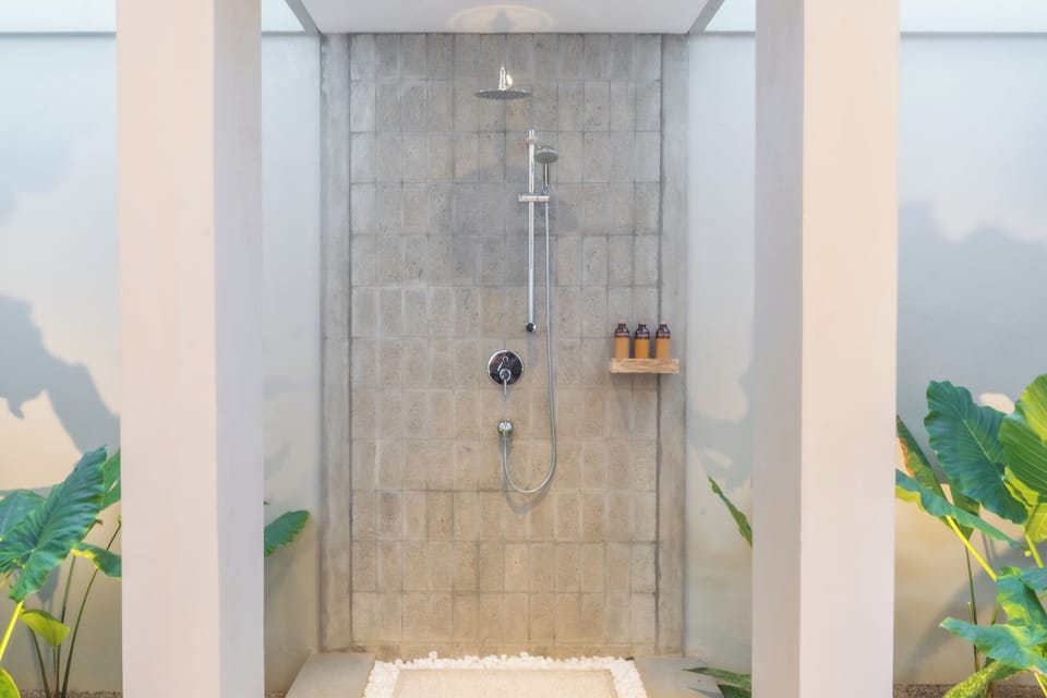 Luxury Villa, 1 King Bed, Non Smoking, Lagoon View | Bathroom | Shower, rainfall showerhead, hair dryer, slippers