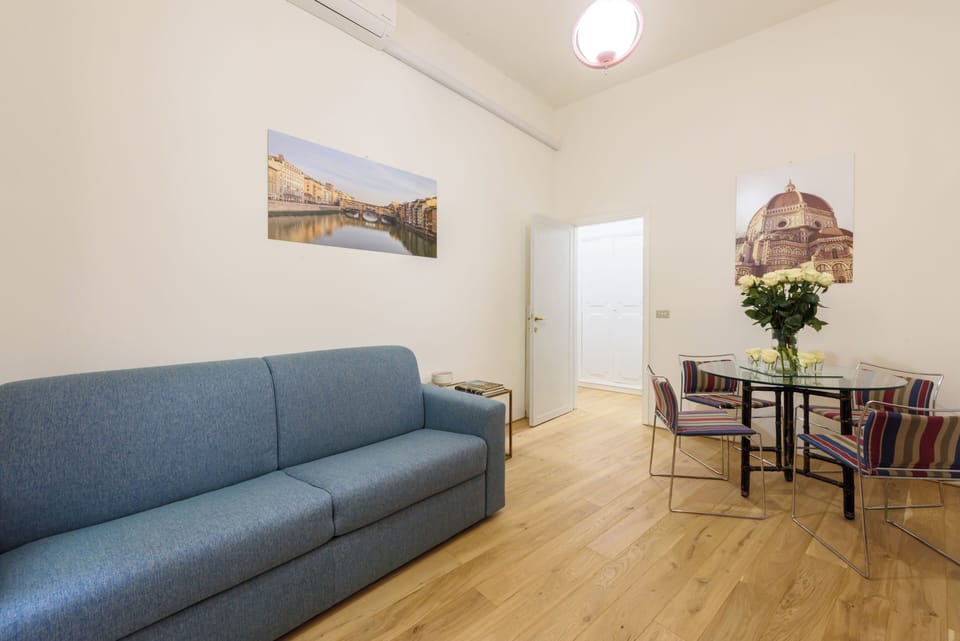 Design Apartment | Living area | 40-inch flat-screen TV with digital channels
