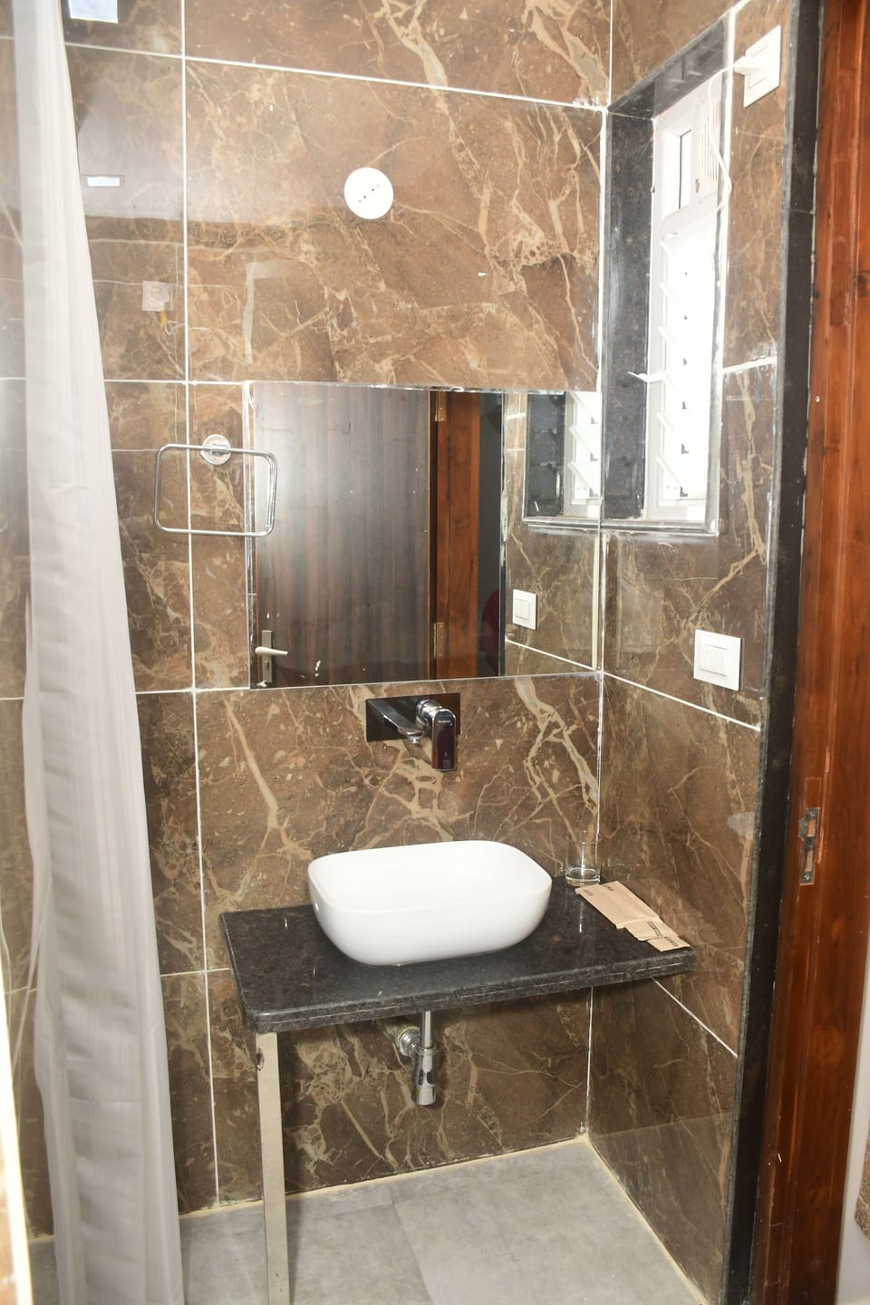 Shower, rainfall showerhead, slippers, towels