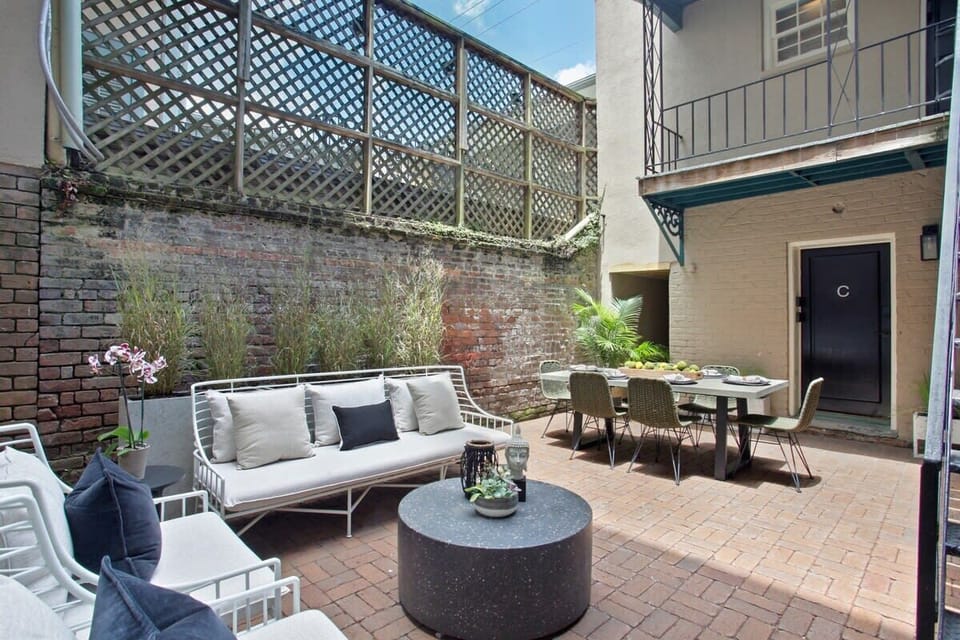  Courtyard | Shared Outdoor Courtyard with Outdoor Sofa and Dining Table | Ground Floor