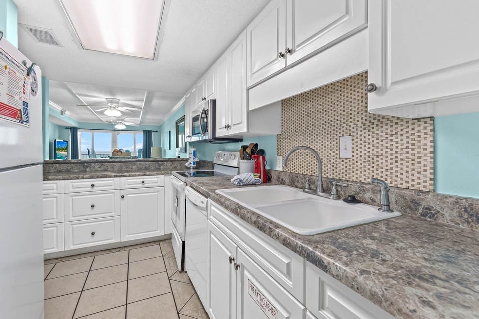 Condo, 2 Bedrooms | Private kitchen | Coffee/tea maker, fridge, oven