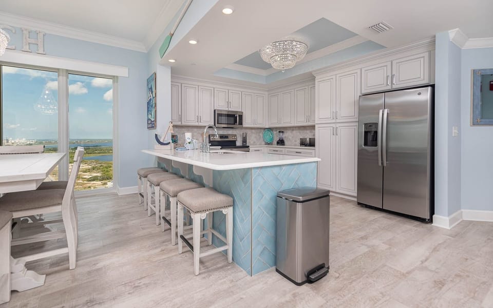 Condo, 4 Bedrooms | Private kitchen | Fridge, oven, coffee/tea maker