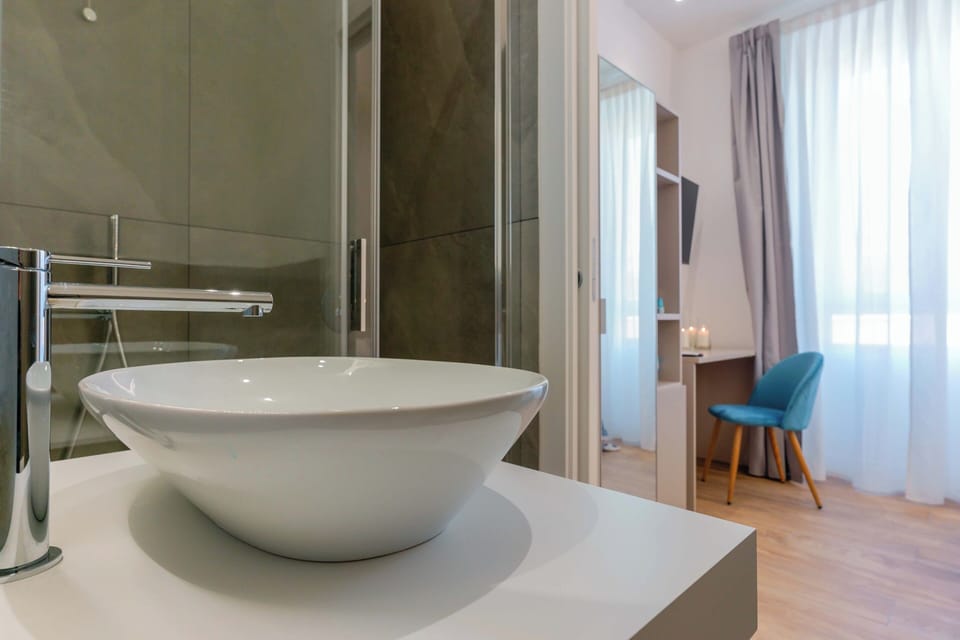 Deluxe Room | 1 bedroom, premium bedding, down comforters, memory foam beds