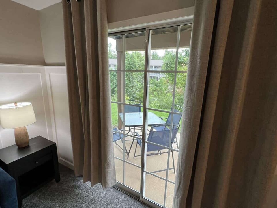 Walk out to patio from living room--great pond views