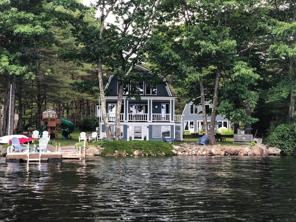 View of main house and guest house from the lake.