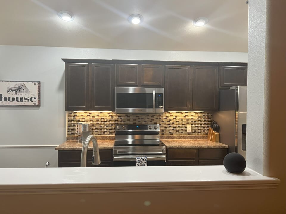 Kitchen - Equipped with new stove and microwave