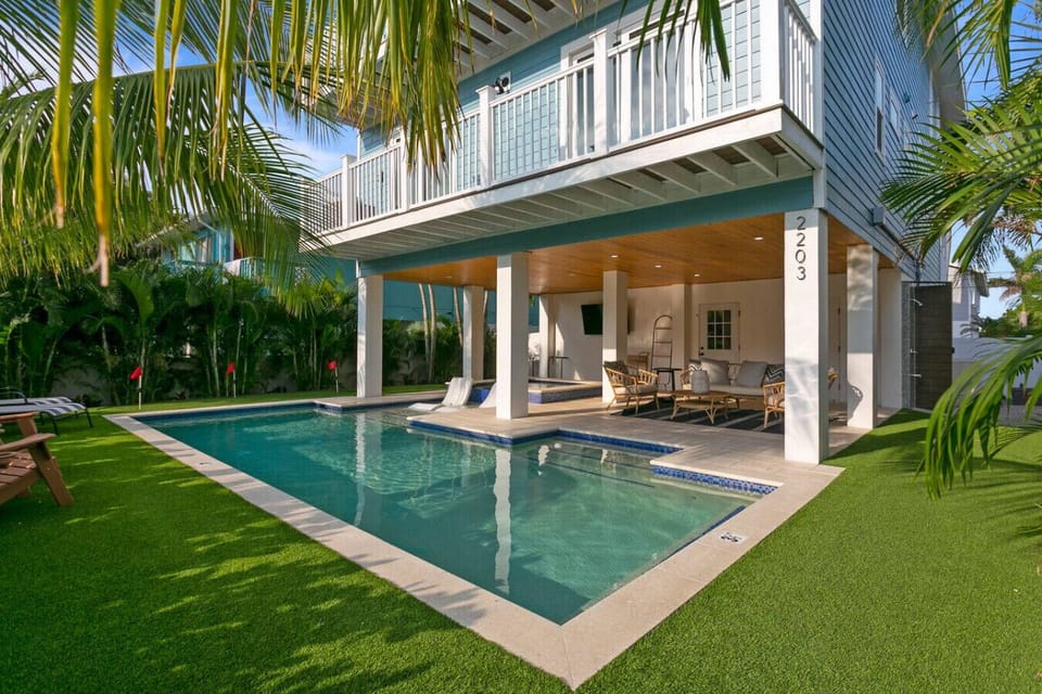 Front entry pool area with putt putt