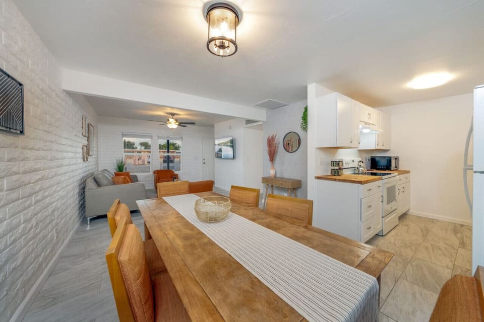 Open floor plan with easy access to the living room, dining area, and kitchen