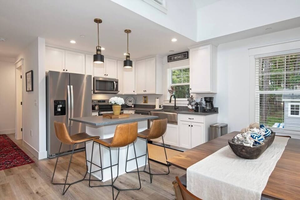 Fully stocked kitchen with island seating.