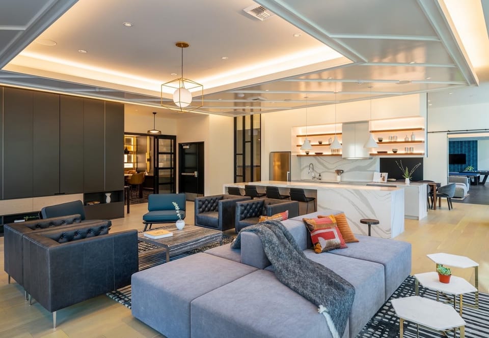 Club Lounge with gaming Area, Kitchen/Dinning, and Seating Area.
