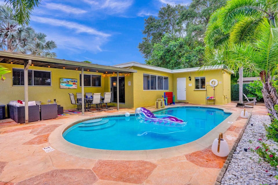 Discover tranquility and sophistication at our poolside haven, complete with a captivating fire pit, offering the perfect balance of comfort and elegance.