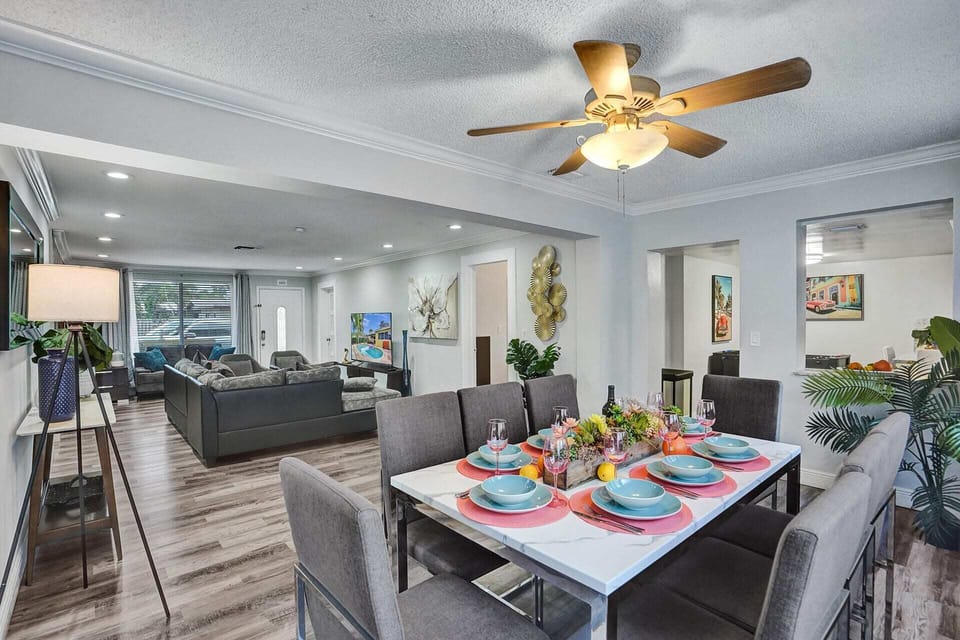 Stunningly spacious living room and adjacent dining area, blending style and comfort effortlessly.