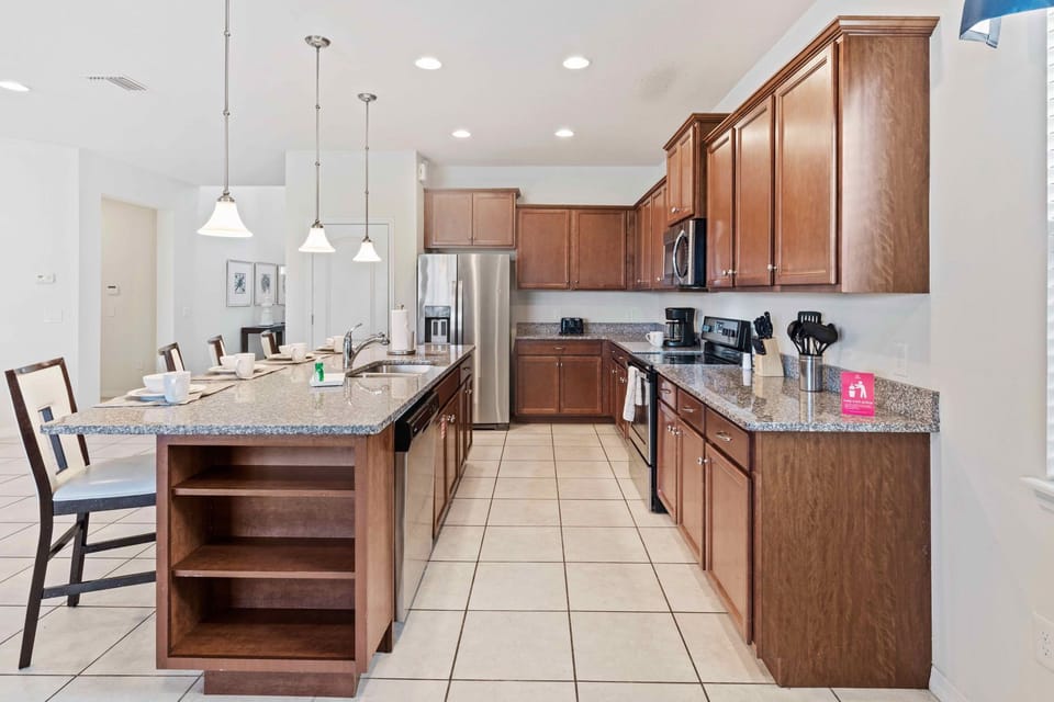 Kitchen magic: Experience convenience and style in our fully equipped kitchen.