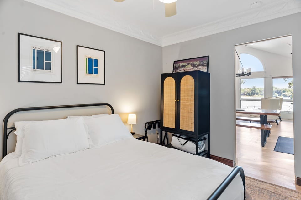 Rest peacefully in your stylish bedroom with crisp linens and thoughtful design touches that create the perfect retreat.
