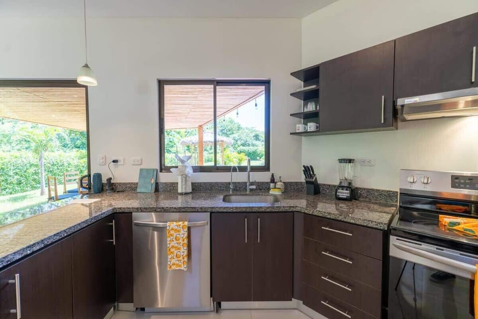 Open kitchen, stainless steel appliances