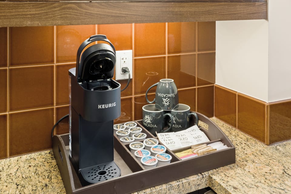 Fully stocked Coffee Bar with Keurig Coffee pods, creamer, sugar and Tea.