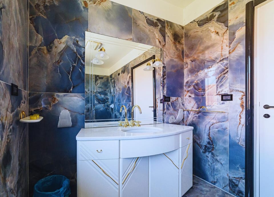 Basic Suite | Bathroom | Hair dryer, slippers, bidet