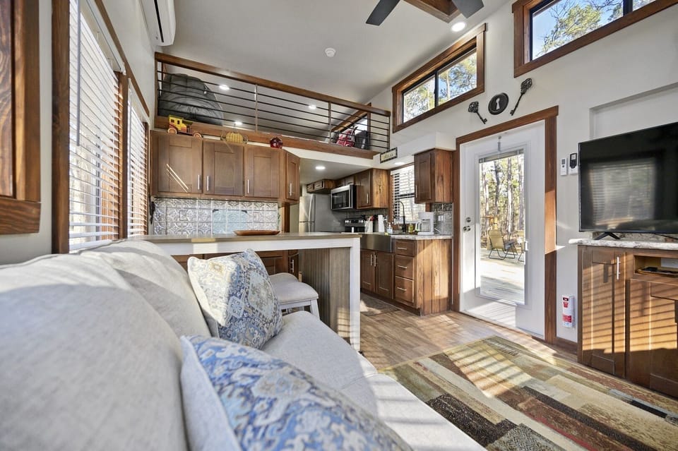 You'll enter the cabin directly into the open concept living and kitchen design keeping everyone connected!