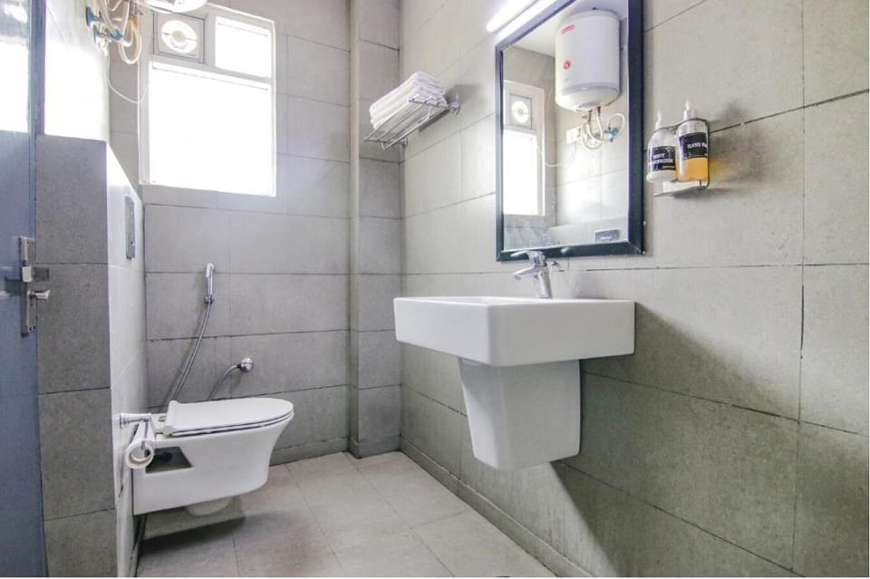 Shower, slippers, toilet paper
