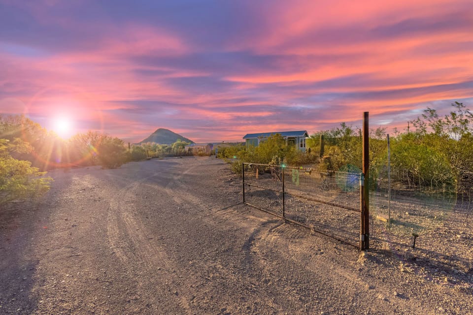 As you enter the property, you're welcomed by desert scenery and mountain views.