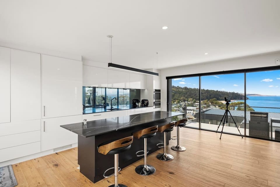 The stylish kitchen with panorama views is fully equipped for your holiday catering. 