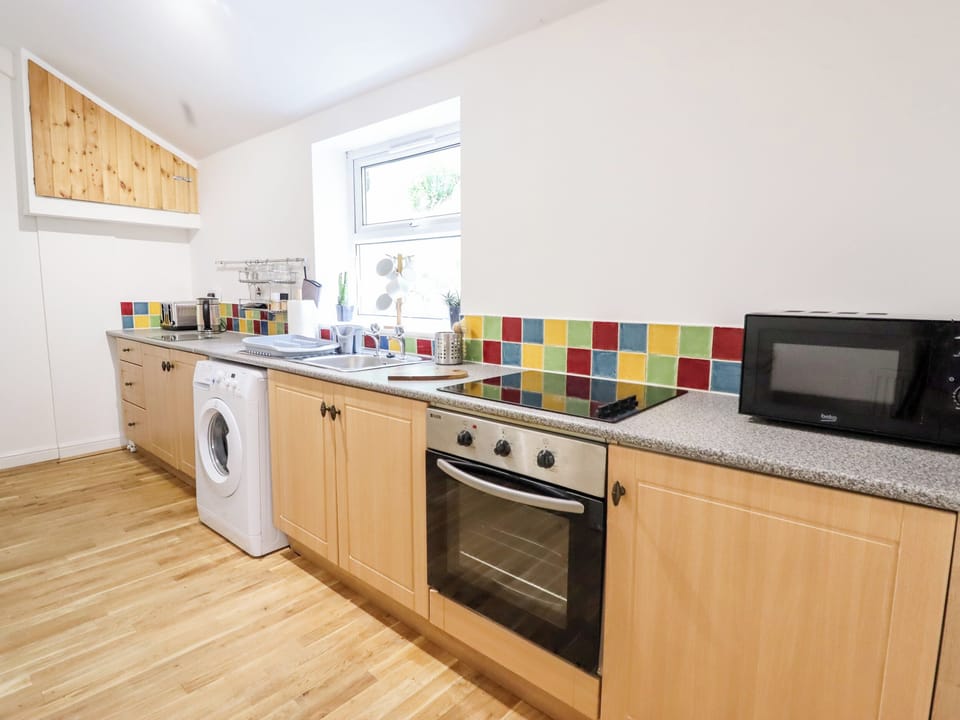 Fridge, electric kettle, toaster, cookware/dishes/utensils