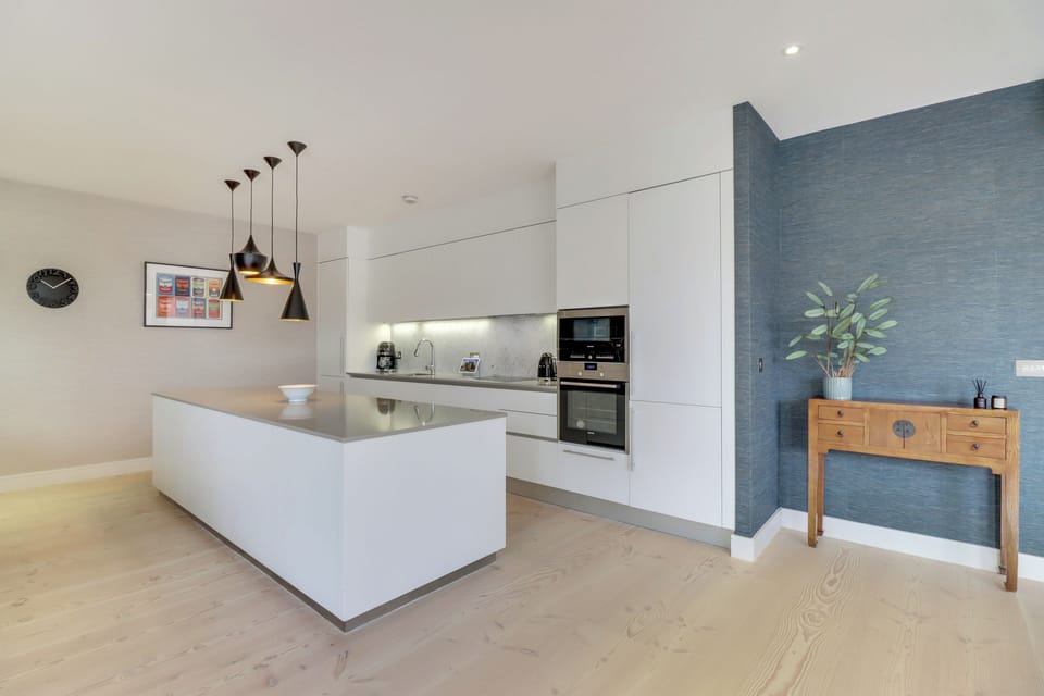 Chef's kitchen with 3 metre long island and stocked with all cooking essentials