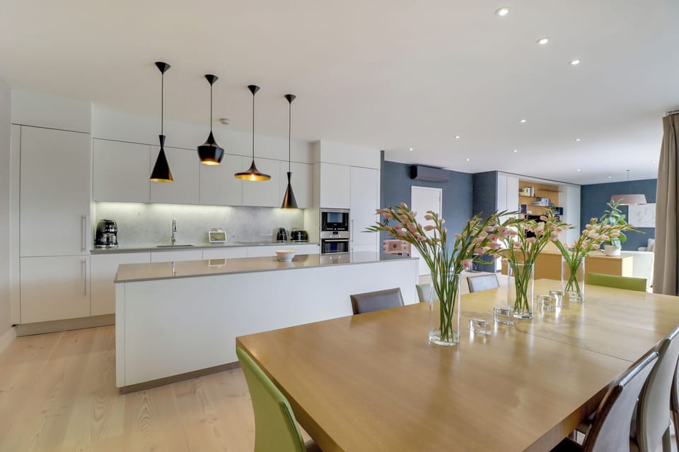 Spacious open plan layout, with designer lighting and interiors throughout