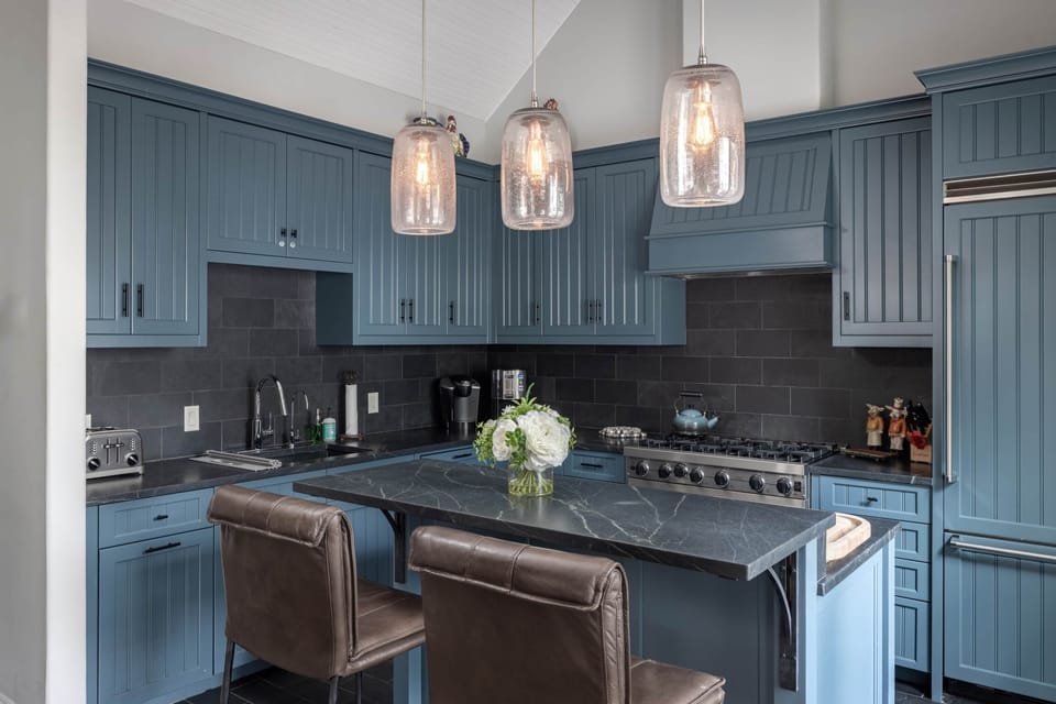 Fully stocked and spacious kitchen with additional seating at breakfast bar