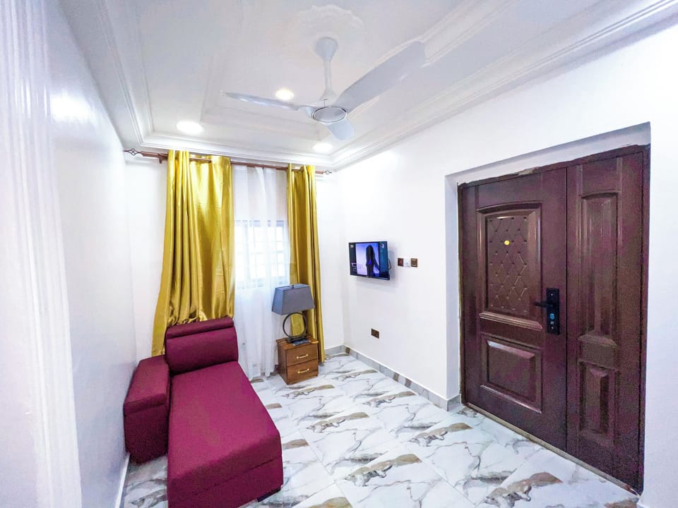 Executive Apartment | Living area | 42-inch Smart TV with satellite channels, Netflix, DVD player