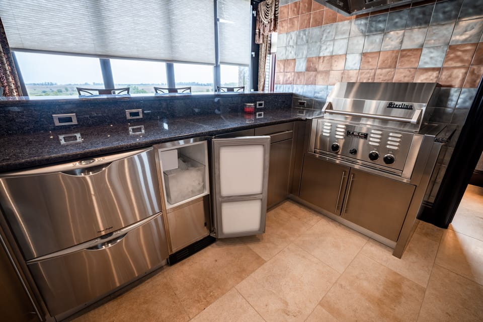 This second kitchen is a perfect prep space for caterers for your next event. 