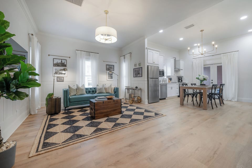 Open airy living room with comfortable seating for 4 - 2 chairs not yet pictured