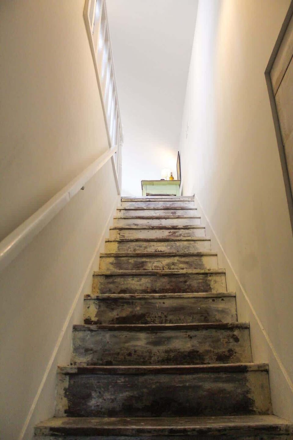 Stairs leading you to up Uppercase Lodging.