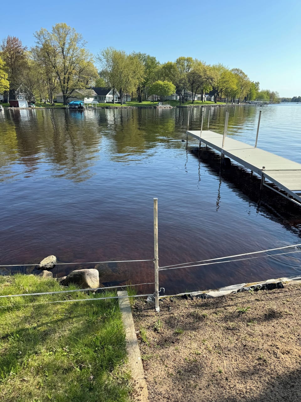 Private dock with small beach area
