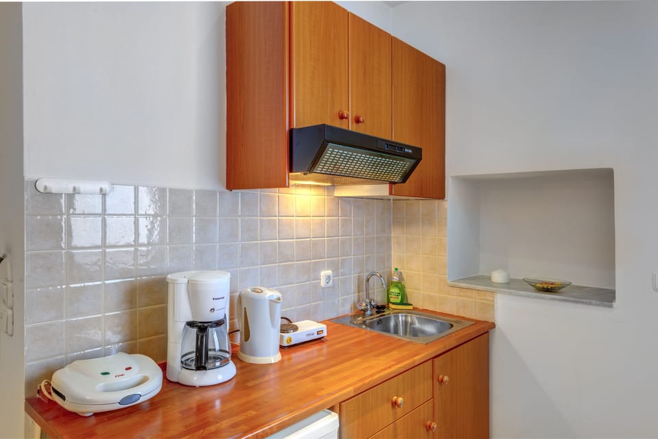 Apartment, Terrace | Private kitchen | Fridge, coffee/tea maker, electric kettle