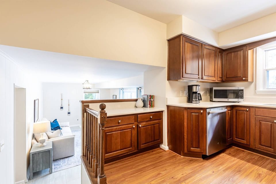 Back inside, and up half a set of stairs from the family room, is the full kitchen.