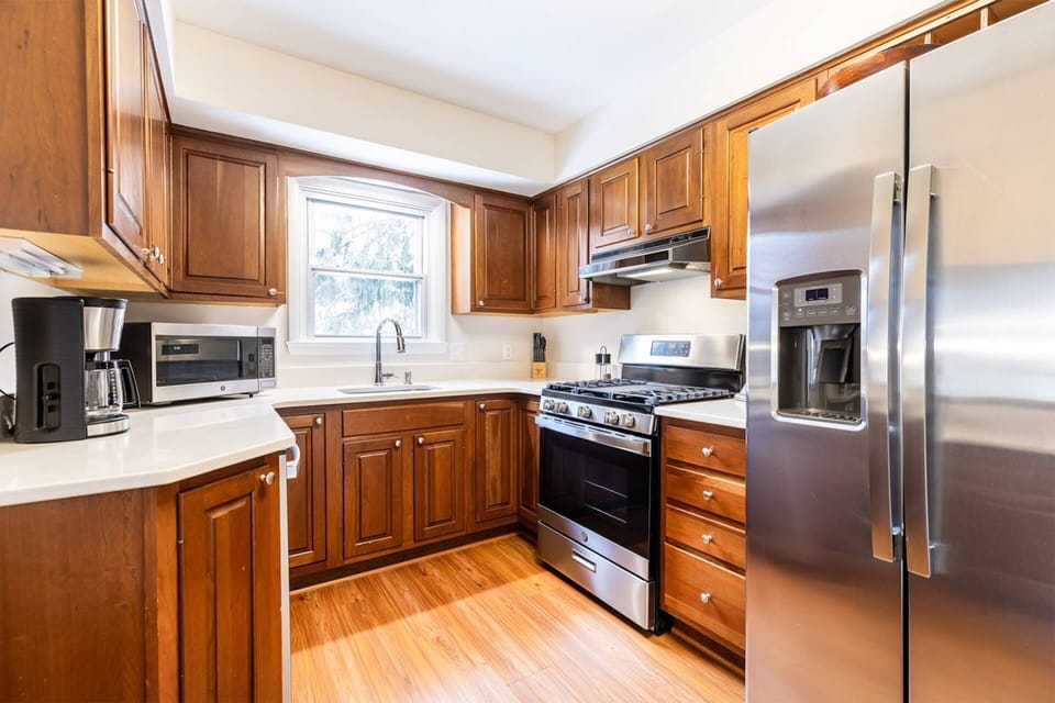 The kitchen is equipped with stainless steel appliances and all the cookware you need to make a family meal.