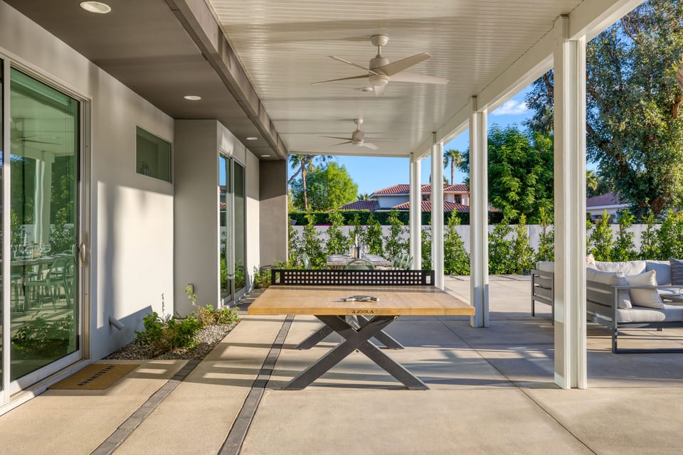 Play a game of ping pong on the covered patio.