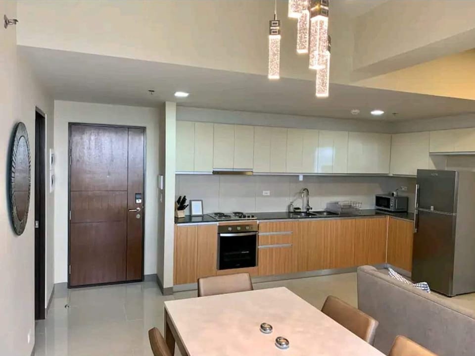 Family Studio Suite, 2 Bedrooms | Private kitchen | Fridge, microwave, cookware/dishes/utensils, paper towels