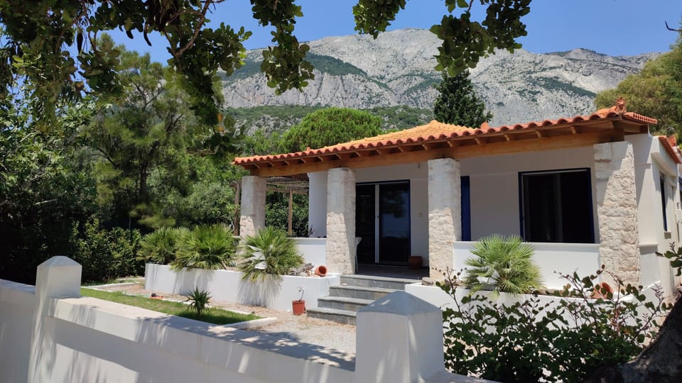 Villa with the cliffs of Mt Kerkis 1km behind