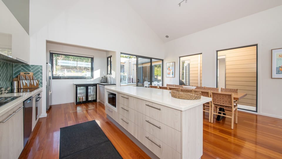 Enjoy our well-equipped kitchen, where sleek countertops provide ample space for food preparation, and modern appliances await to assist you.
