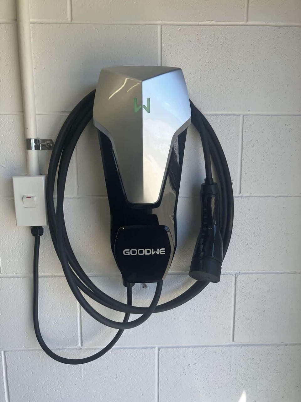 On-site EV charger for electric vehicle guests — eco-friendly amenity at this modern Rotorua self-contained holiday home