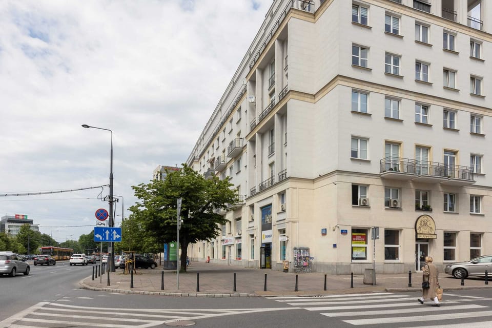 A street corner with classic architecture, creating a blend of historical charm and urban life.
