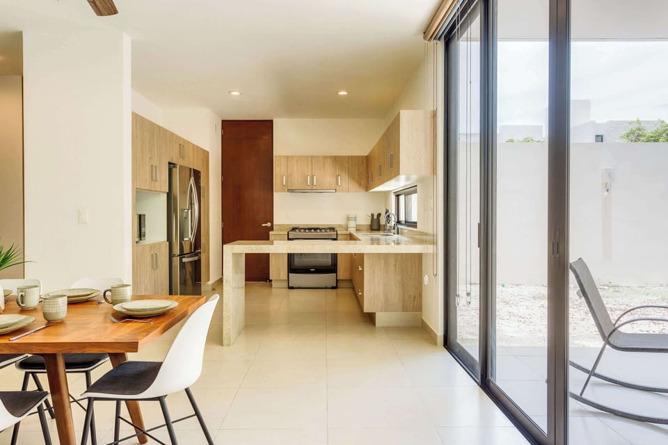 Whip up a meal, share stories, and slide open to the patio.