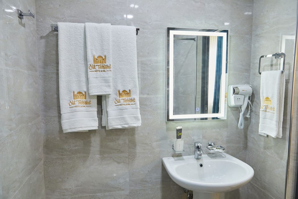 Hair dryer, slippers, towels, soap