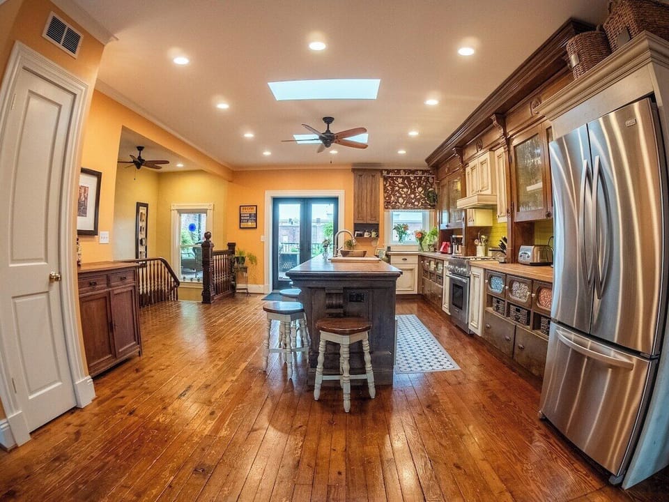 3rd floor looking toward the French doors leading to rooftop deck