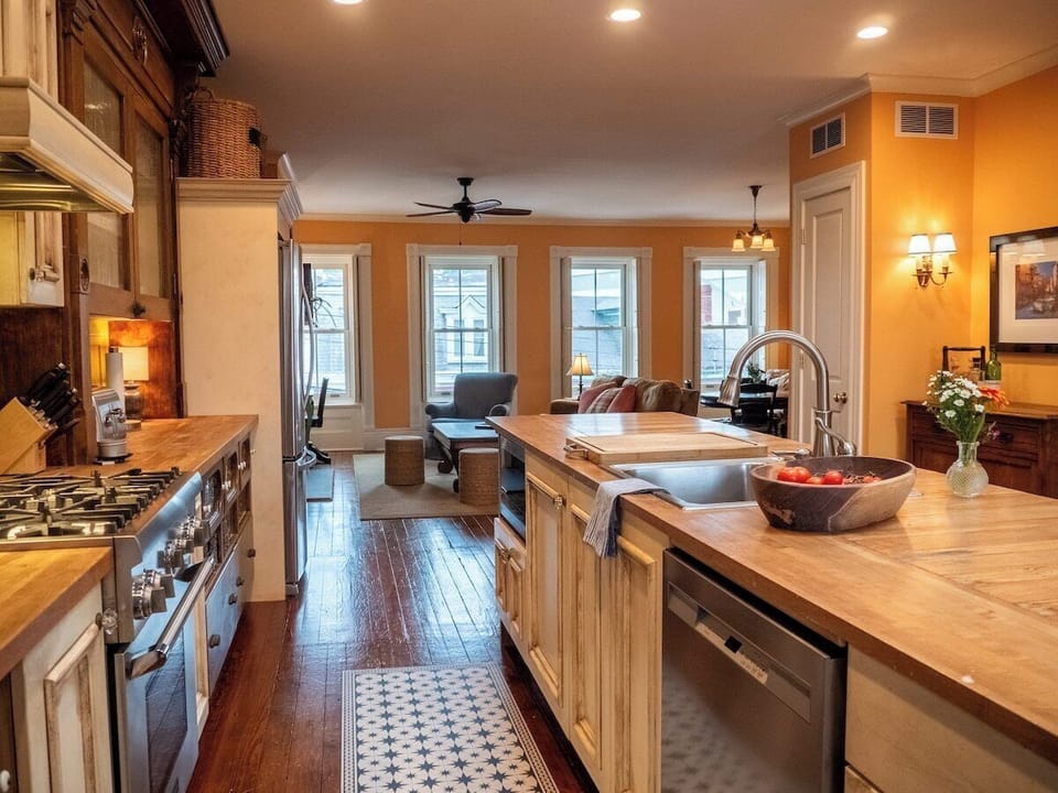3rd floor open floor plan/ kitchen looking toward the living area