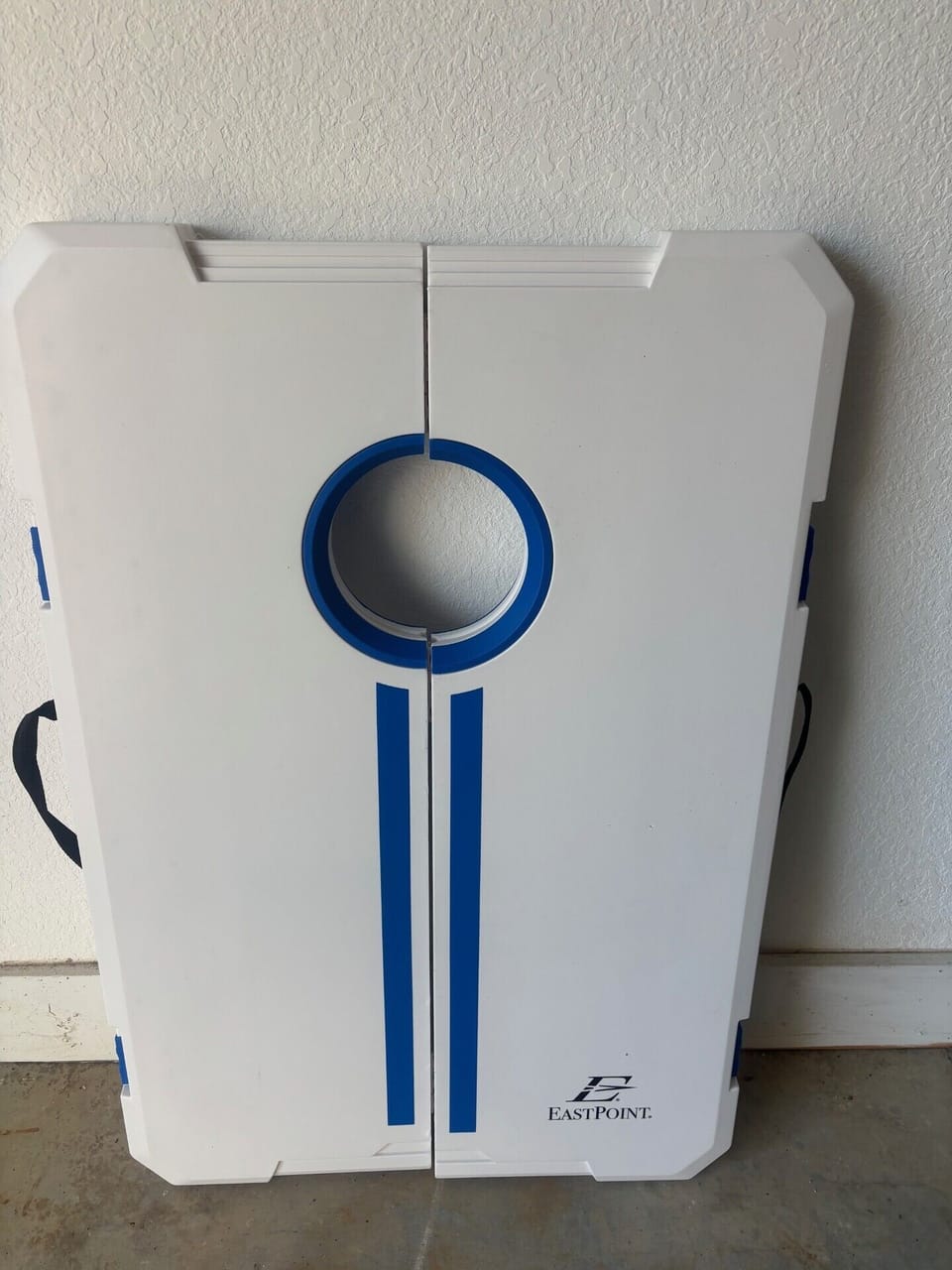 Cornhole located in the garage.