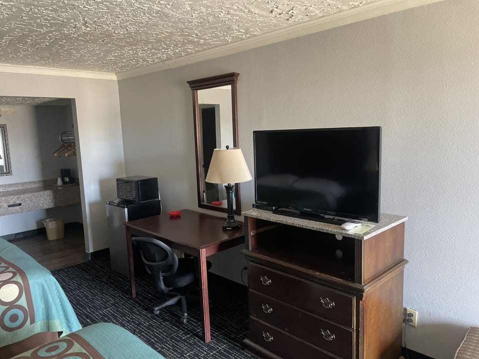 Standard Room, 2 Queen Beds, Smoking | 1 bedroom, blackout drapes, iron/ironing board, free WiFi